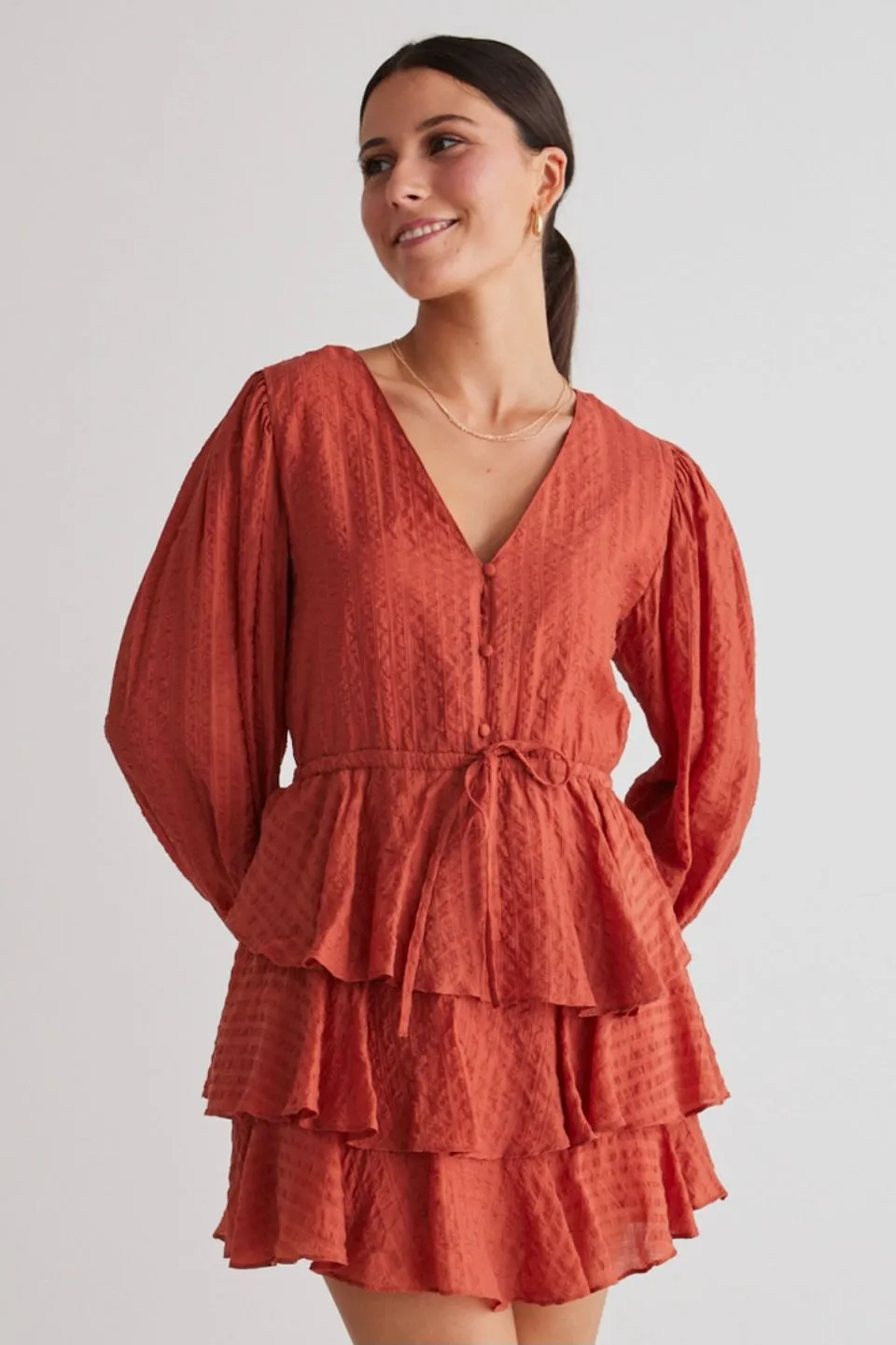 Evita Rust LS V Neck Mini Tiered Dress